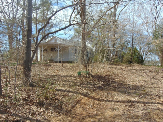 view of yard featuring a porch