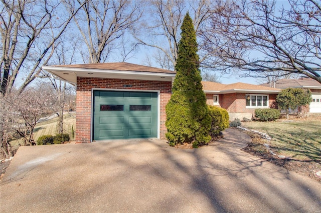 view of front of property with brick siding and driveway