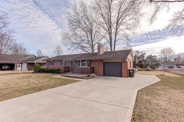 ranch-style home featuring a garage, concrete driveway, brick siding, and a front lawn