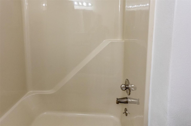 details with shower / bath combination