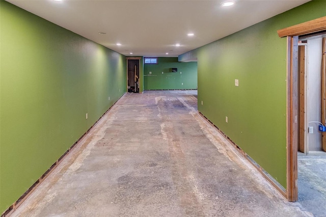 interior space with concrete flooring and recessed lighting