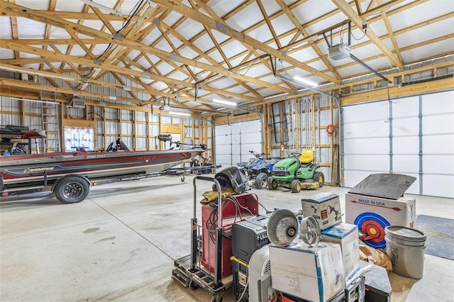 garage featuring metal wall and a garage door opener