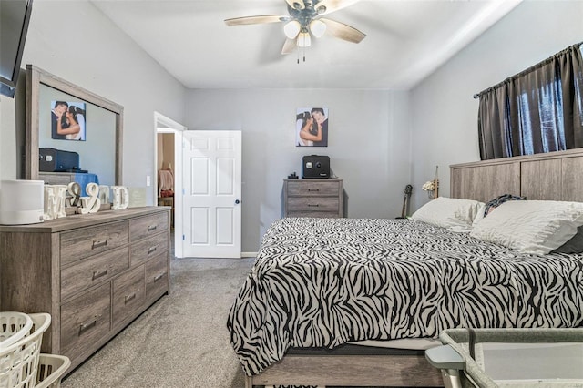 carpeted bedroom with a ceiling fan