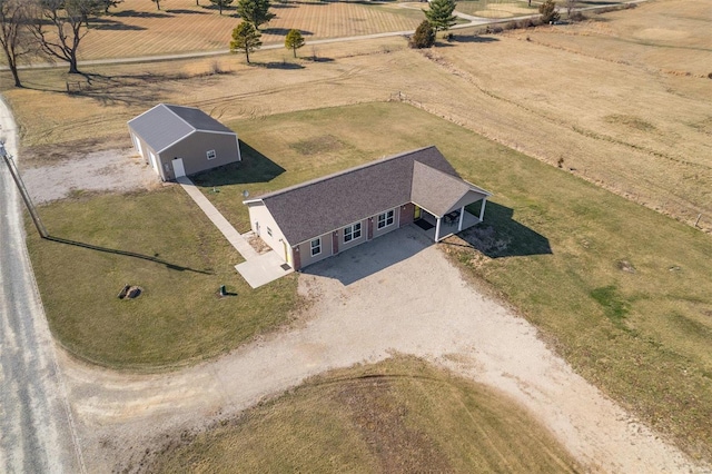 birds eye view of property with a rural view