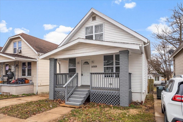 bungalow-style house featuring covered porch