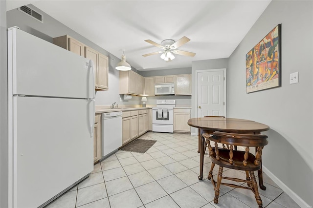 kitchen featuring light countertops, visible vents, a ceiling fan, white appliances, and baseboards