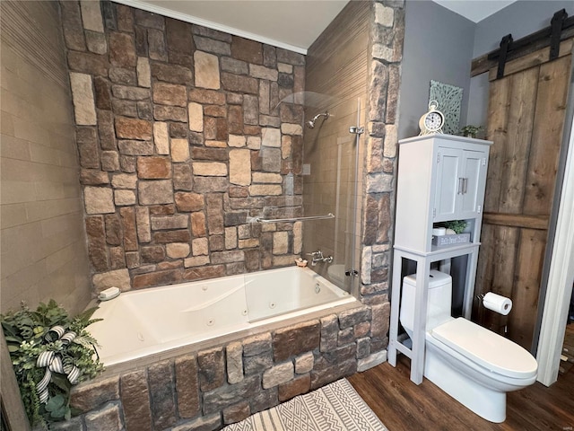 full bathroom with toilet, wood finished floors, and a combined bath / shower with jetted tub