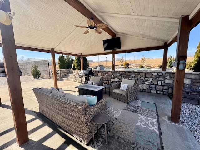 view of patio featuring outdoor lounge area and a grill