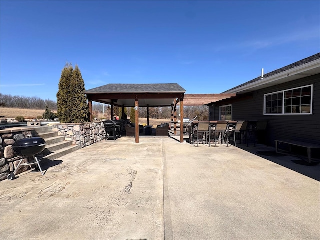 view of patio / terrace with grilling area, an outdoor hangout area, a pergola, and outdoor dining space