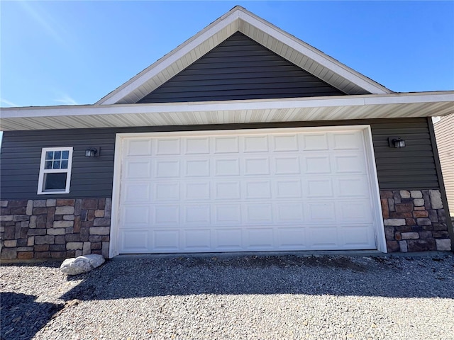 garage featuring driveway