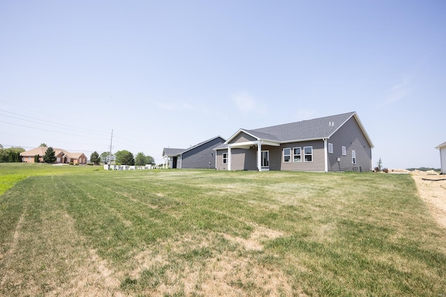 ranch-style house with a front lawn