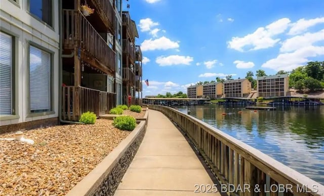 view of home's community featuring a water view