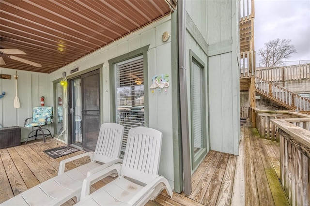 wooden terrace with ceiling fan