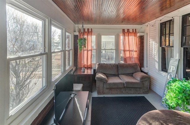 sunroom featuring wooden ceiling