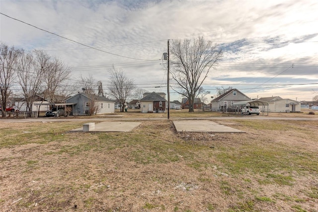 view of yard featuring a residential view