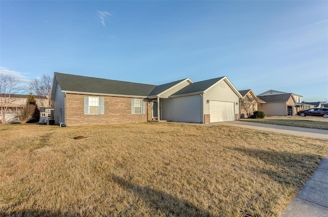 single story home featuring a garage, driveway, a front lawn, and brick siding