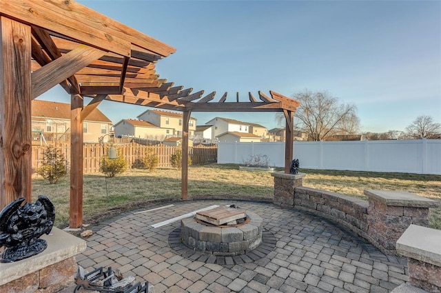 view of patio featuring an outdoor fire pit, fence, and a pergola