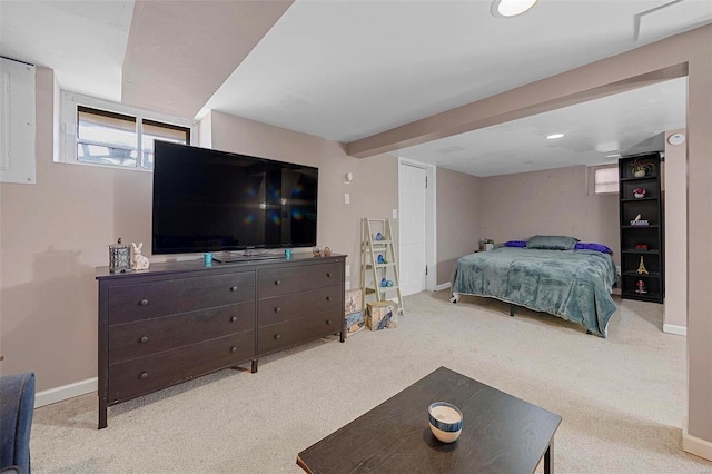 carpeted bedroom featuring baseboards