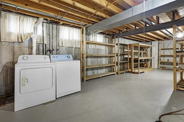 basement with separate washer and dryer