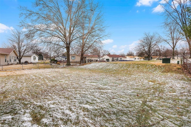 view of yard with a residential view and fence