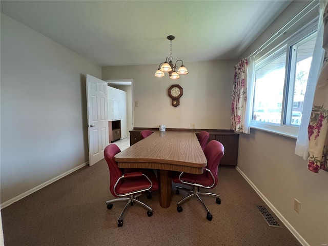 dining space with baseboards, visible vents, and carpet floors