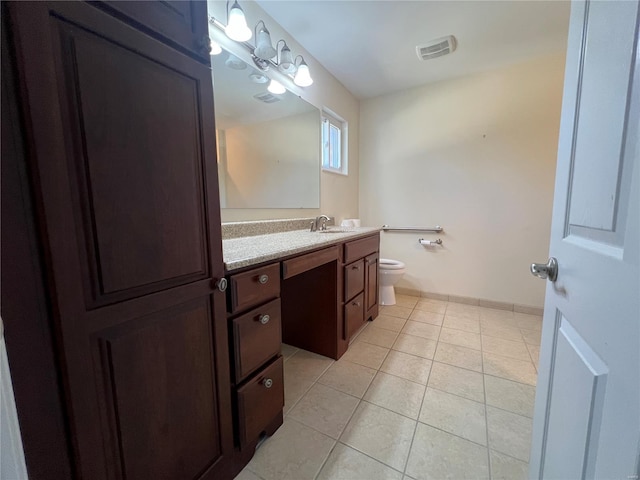 bathroom with tile patterned floors, visible vents, vanity, and toilet