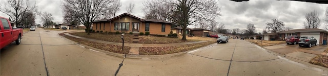 exterior space with concrete driveway