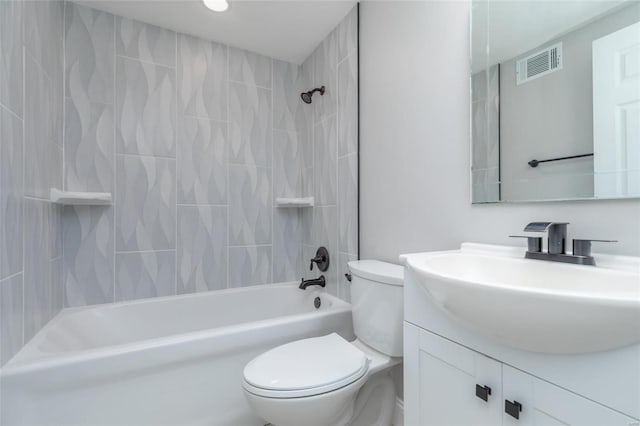 full bathroom featuring toilet, washtub / shower combination, visible vents, and vanity