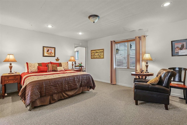 carpeted bedroom with recessed lighting and baseboards