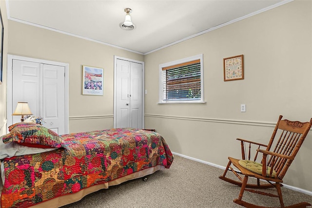 bedroom featuring carpet, ornamental molding, and baseboards