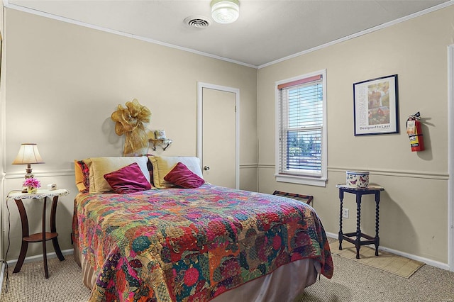 carpeted bedroom featuring ornamental molding, visible vents, and baseboards