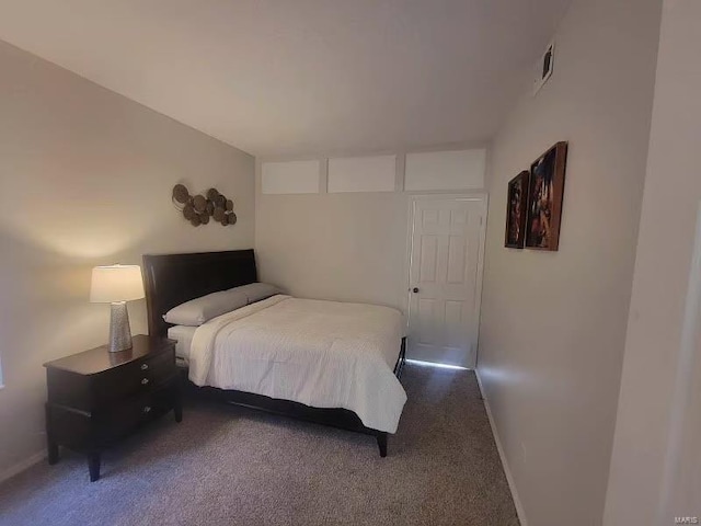 bedroom with baseboards, visible vents, and carpet flooring