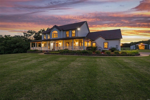 view of front of home with a porch and a front lawn
