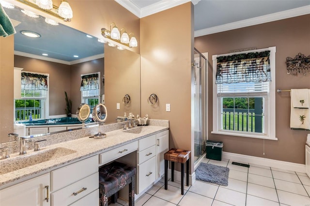 bathroom with tile patterned floors, a sink, a shower stall, crown molding, and double vanity
