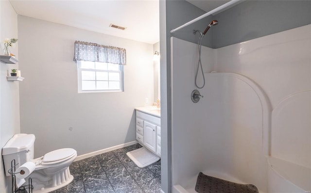 full bathroom with toilet, a shower, visible vents, and baseboards