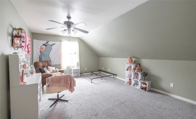 game room with lofted ceiling, ceiling fan, carpet flooring, and baseboards