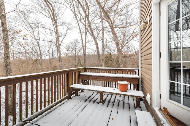 view of snow covered deck