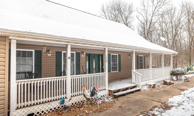 country-style home with covered porch