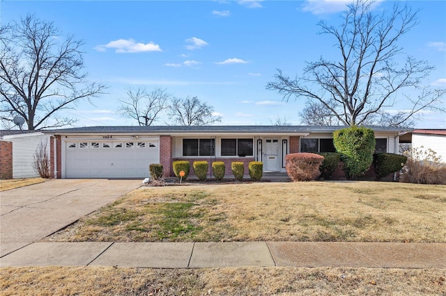 ranch-style house featuring driveway, an attached garage, a front lawn, and brick siding