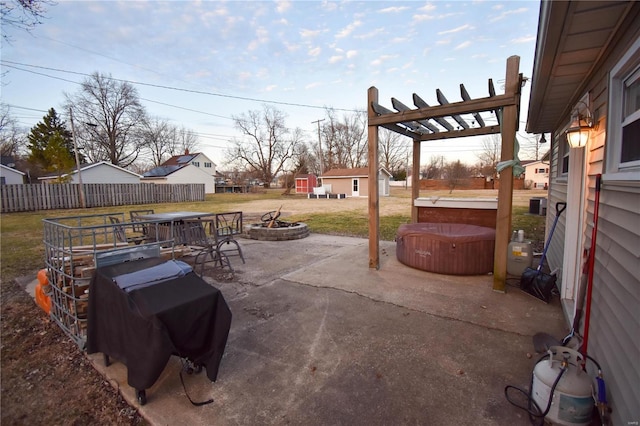 view of patio with a pergola, a grill, an outdoor fire pit, and fence