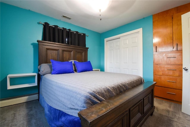 bedroom featuring a closet, visible vents, a baseboard radiator, and dark colored carpet