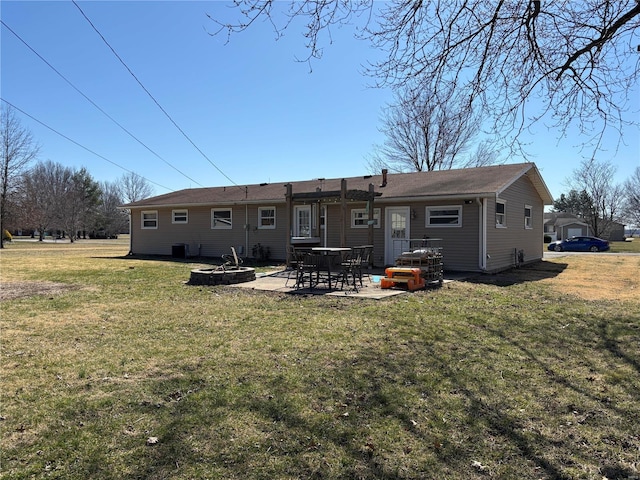 back of house with a yard, central AC, and a patio area