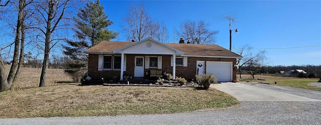 view of front facade with a porch, an attached garage, a chimney, concrete driveway, and brick siding