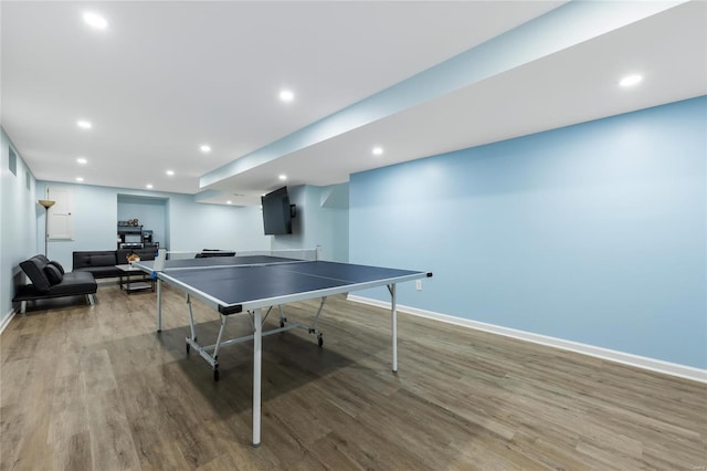 game room with baseboards, wood finished floors, and recessed lighting