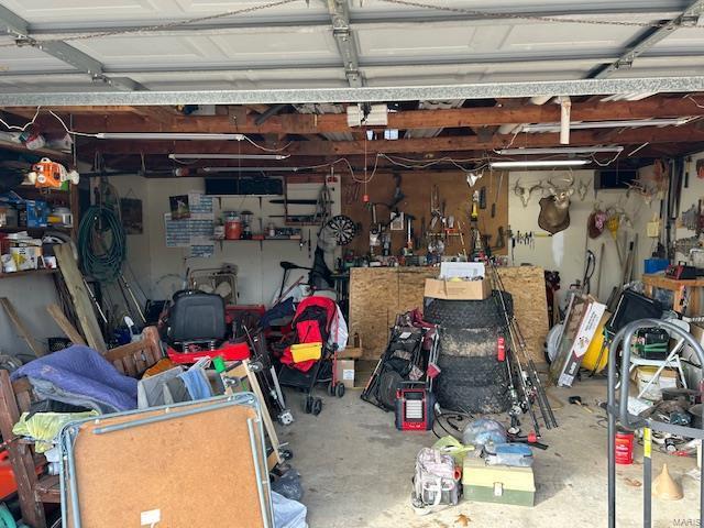 garage featuring a workshop area