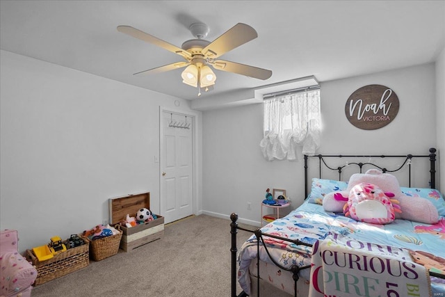 bedroom with carpet floors, ceiling fan, and baseboards