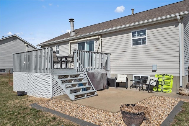 back of house with stairway and a wooden deck