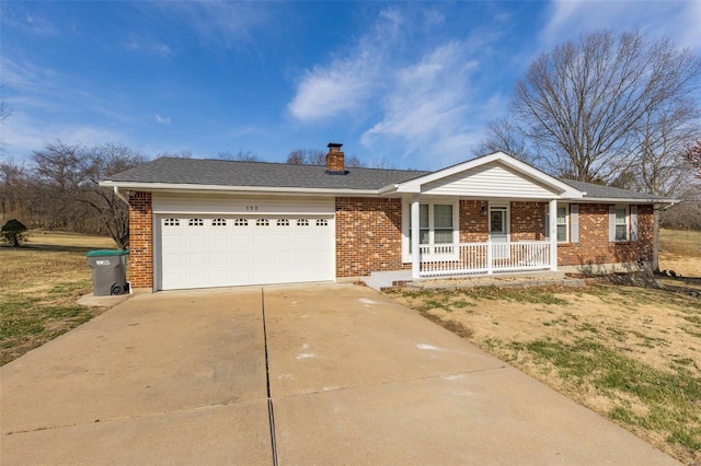 ranch-style house with an attached garage, brick siding, and driveway