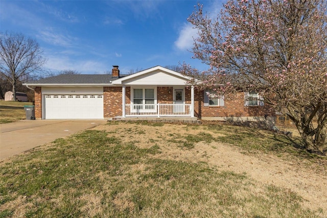 ranch-style home featuring a porch, a chimney, concrete driveway, a garage, and brick siding