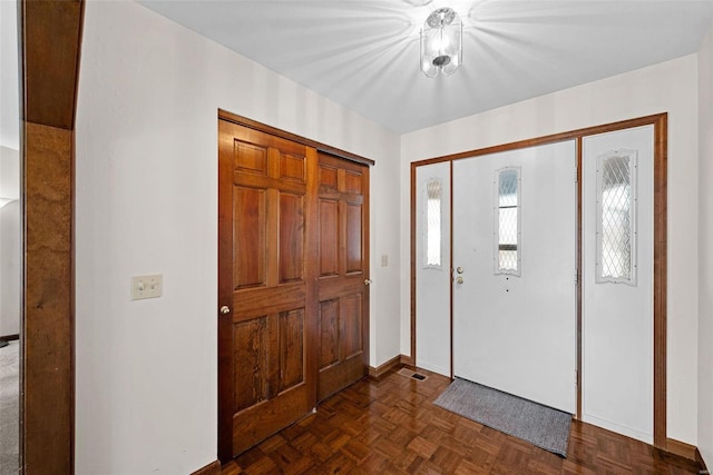 entrance foyer featuring baseboards